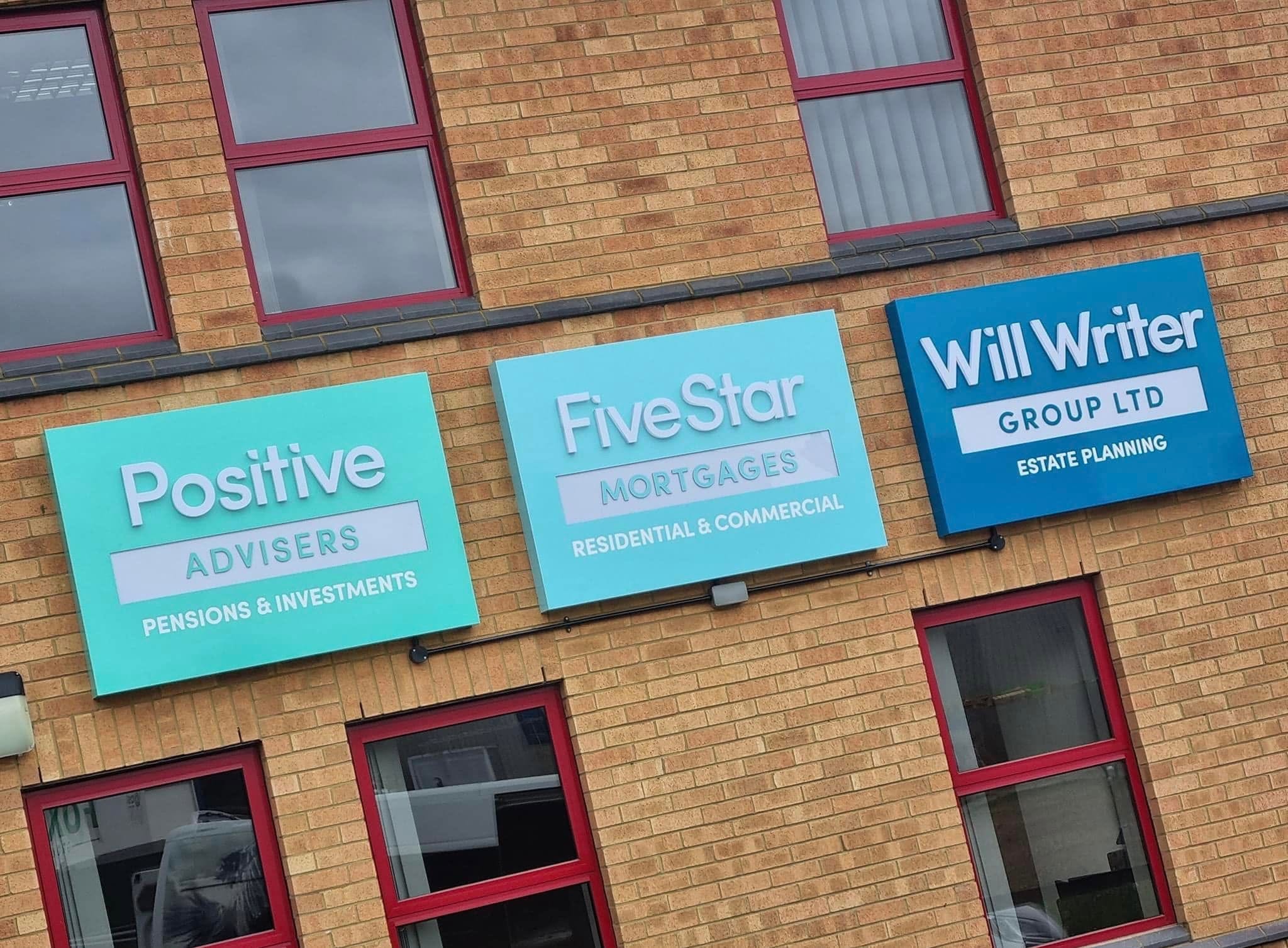 Positive Advisers signage at the Corby head office